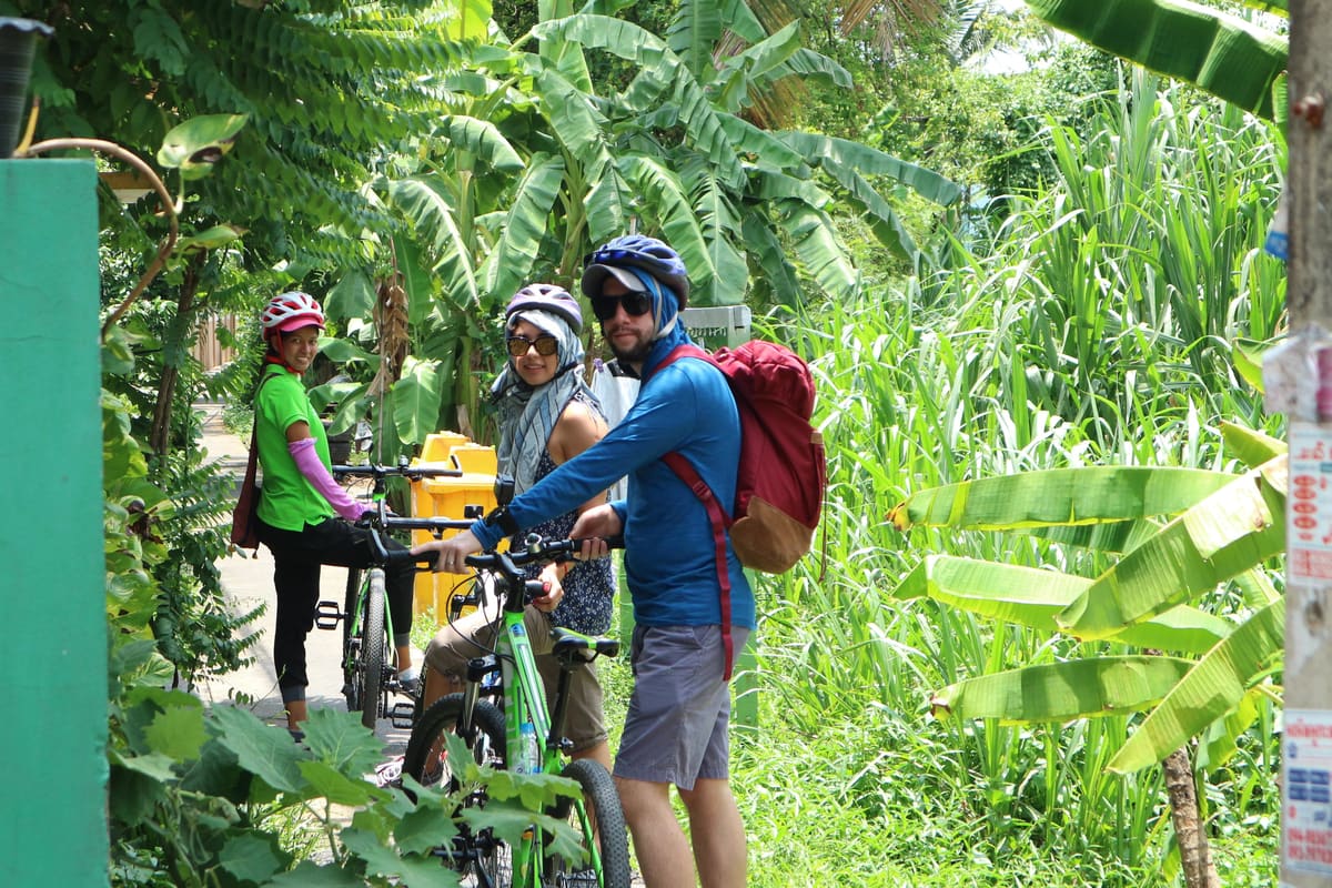 Cyclists on the Bike, Canal Boat & Lunch tour in Bangkok