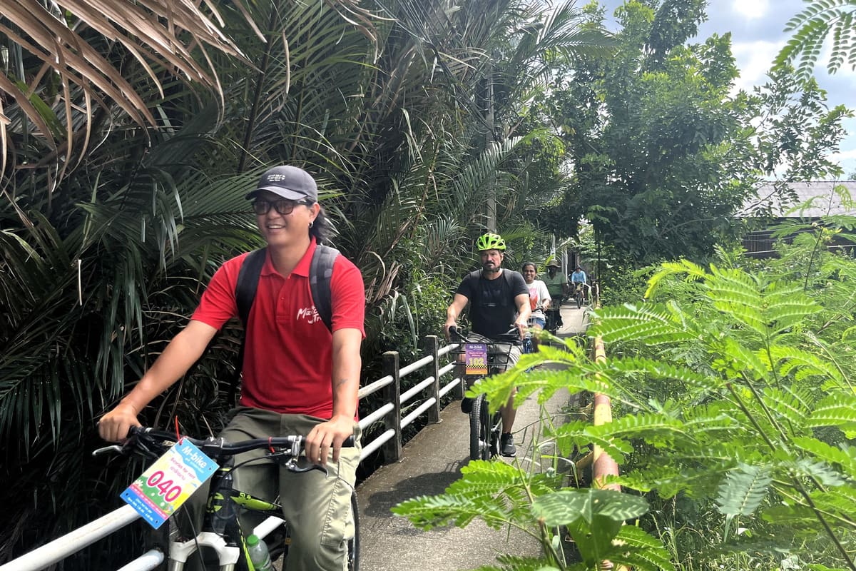 Cyclists on the Green Oasis Nature Tour tour in Bangkok