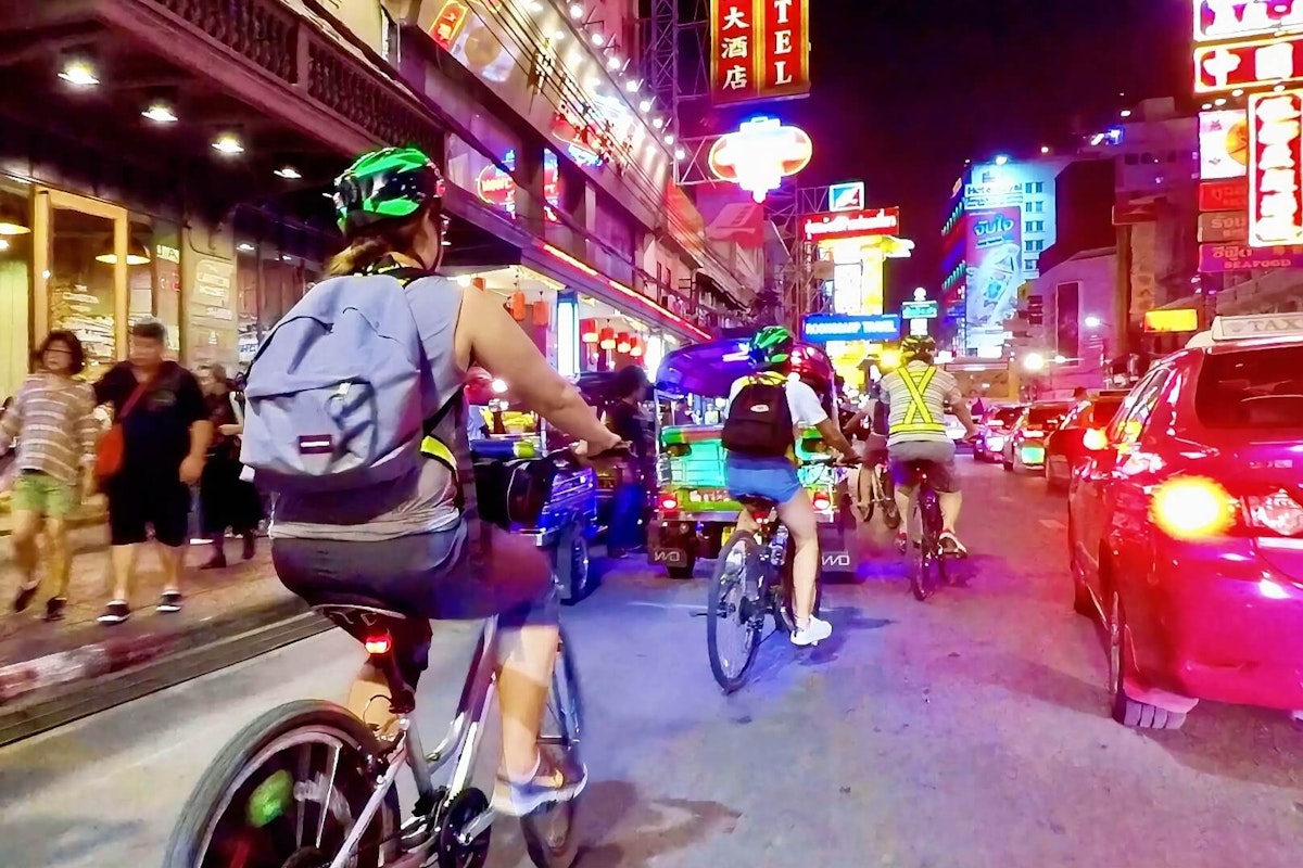 Cyclists on the Night Ride & Chinatown Dinner tour in Bangkok